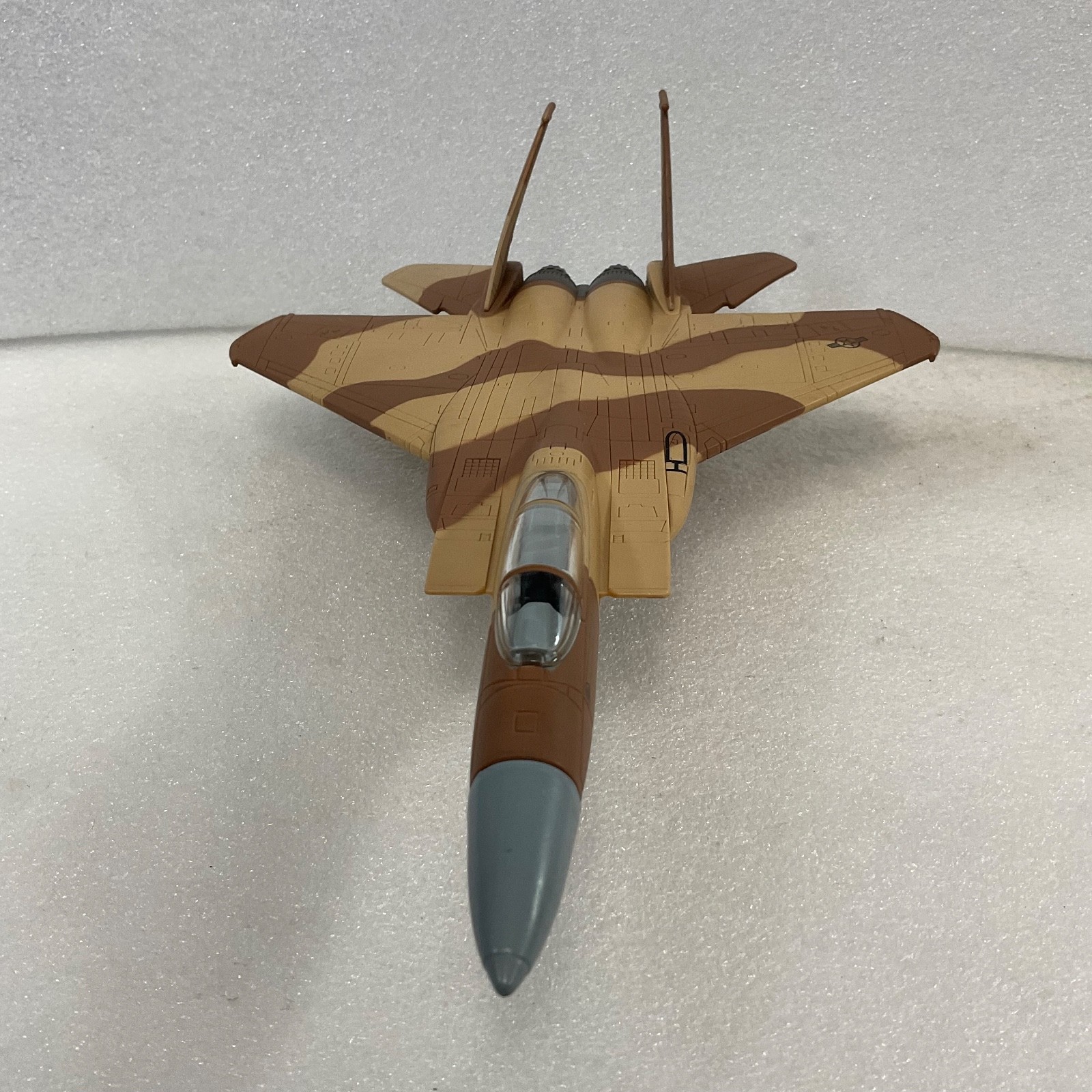 2009 Unimax F-15 Fighter Jet Model 10.5in Length 7in Wingspan Desert Camo - Image 1