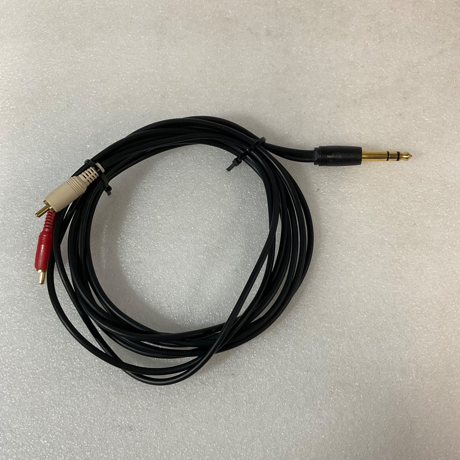 Radio Shack 1/4 in TRS Male to Dual RCA Male Audio Adapter Cable 72 in - Image 1