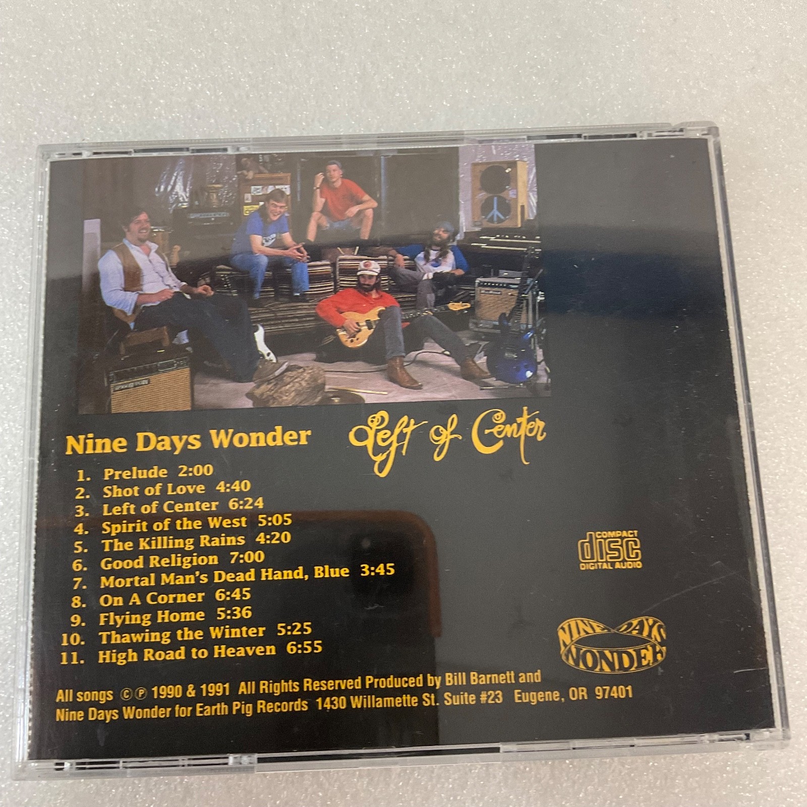 Nine Days Wonder Left of Center CD Rare Cover Art Earth Pig Records 1990 - Image 2