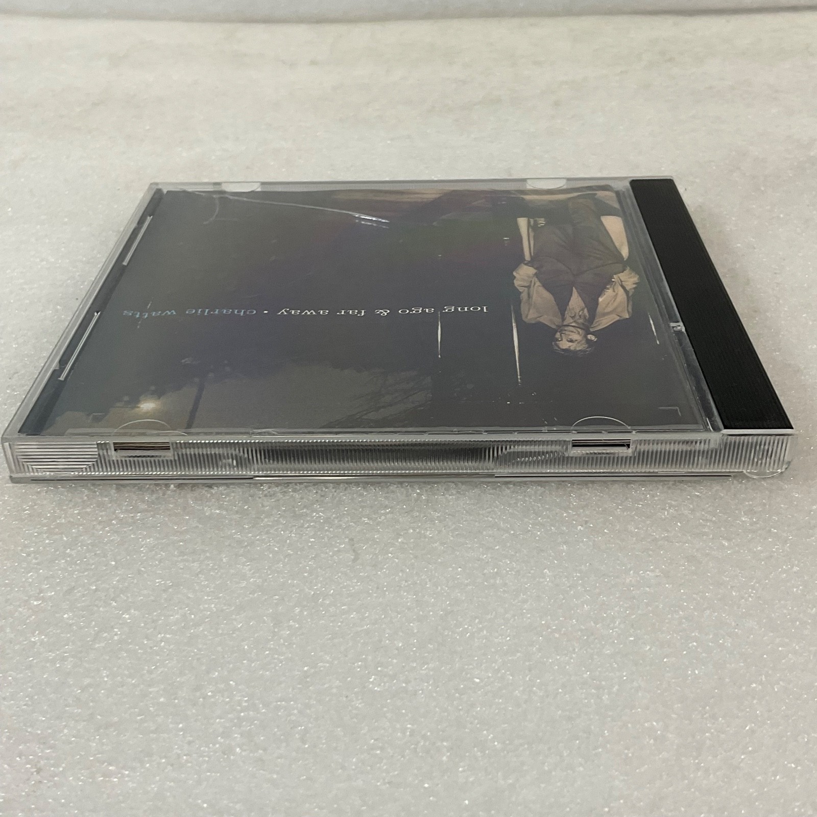 This listing is for a pre-owned CD copy of Long Ago & Far Away by Charlie Watts - Image 6