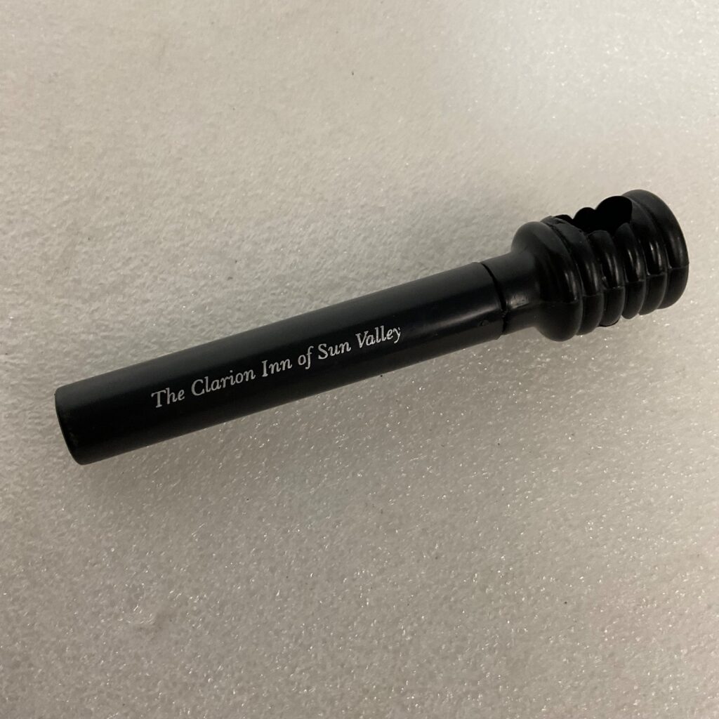Vintage Clarion Inn Sun Valley 4in Travel Corkscrew Black Plastic Wine Opener - Image 1