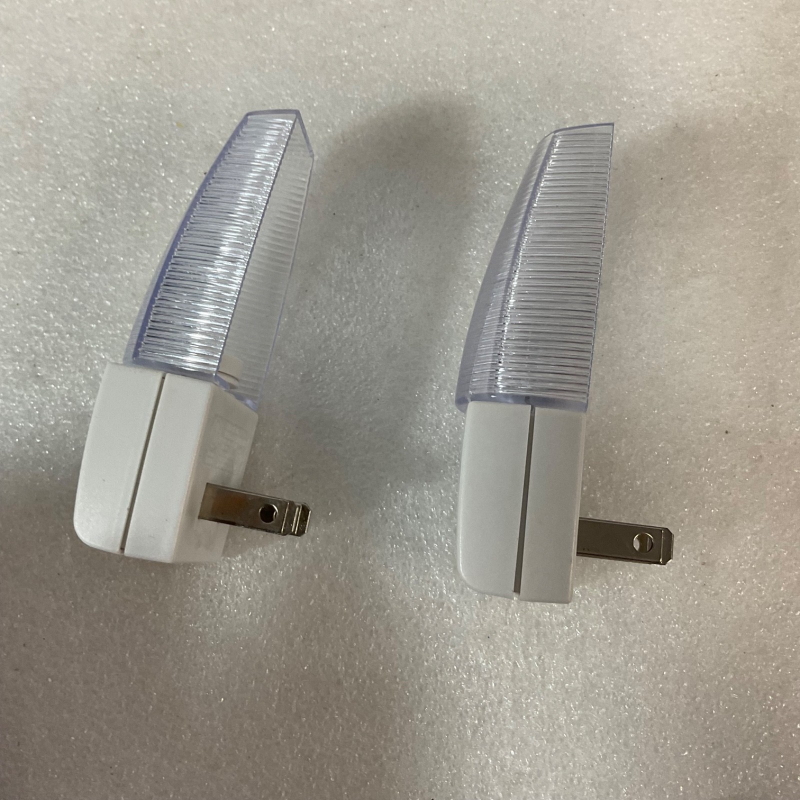 LED Plug In Night Light 4in Ribbed Clear Lens White Base 2pc - Image 2