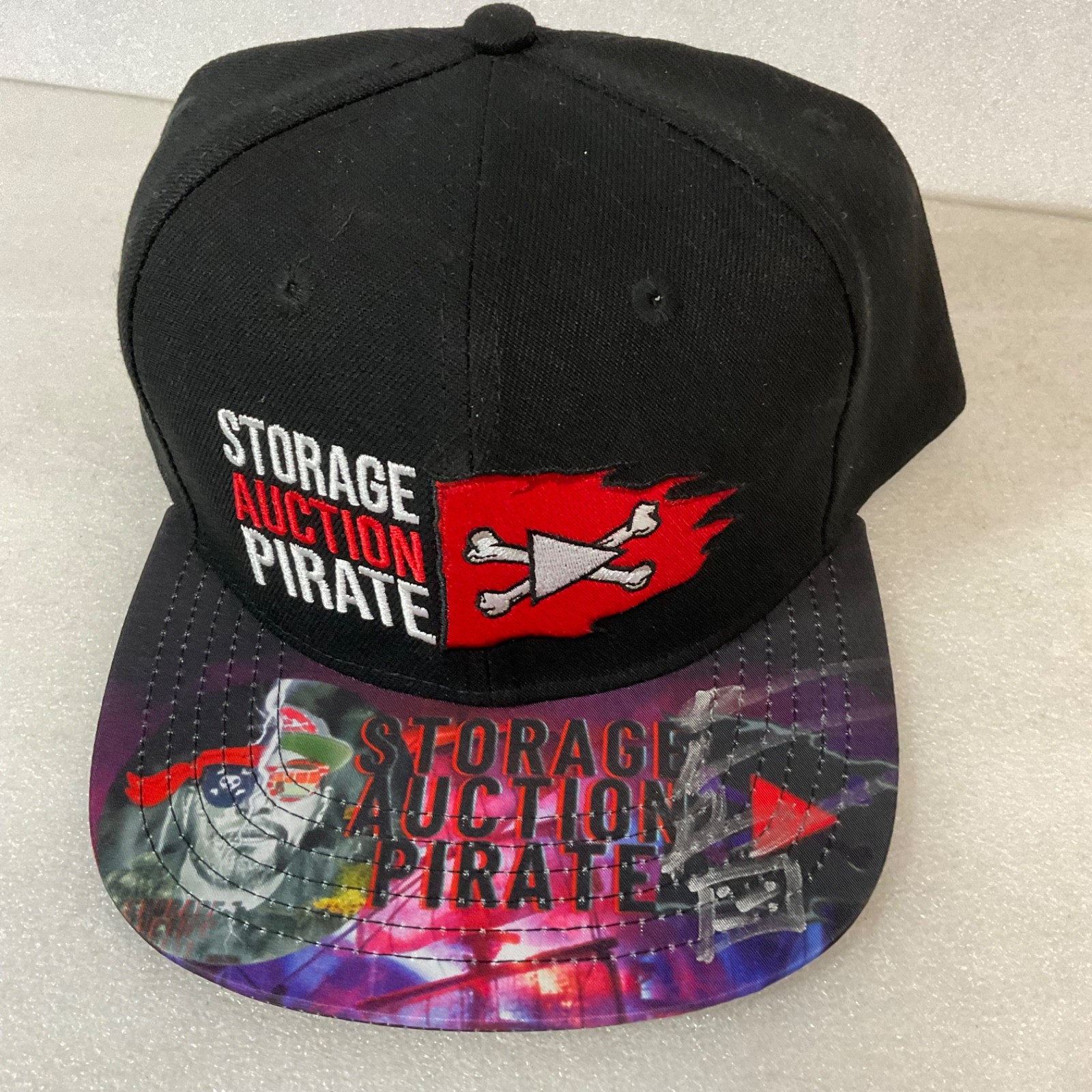 Storage Auction Pirate Snapback Hat Black Embroidered Graphic - Image 1