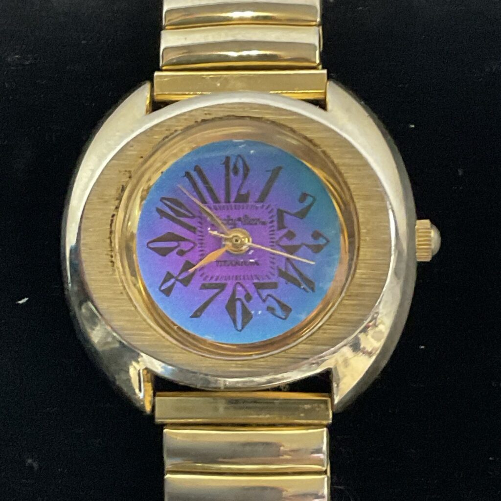 Lucky Star Titanium Purple Face Hold Tone Stretch Band Watch - Image 1