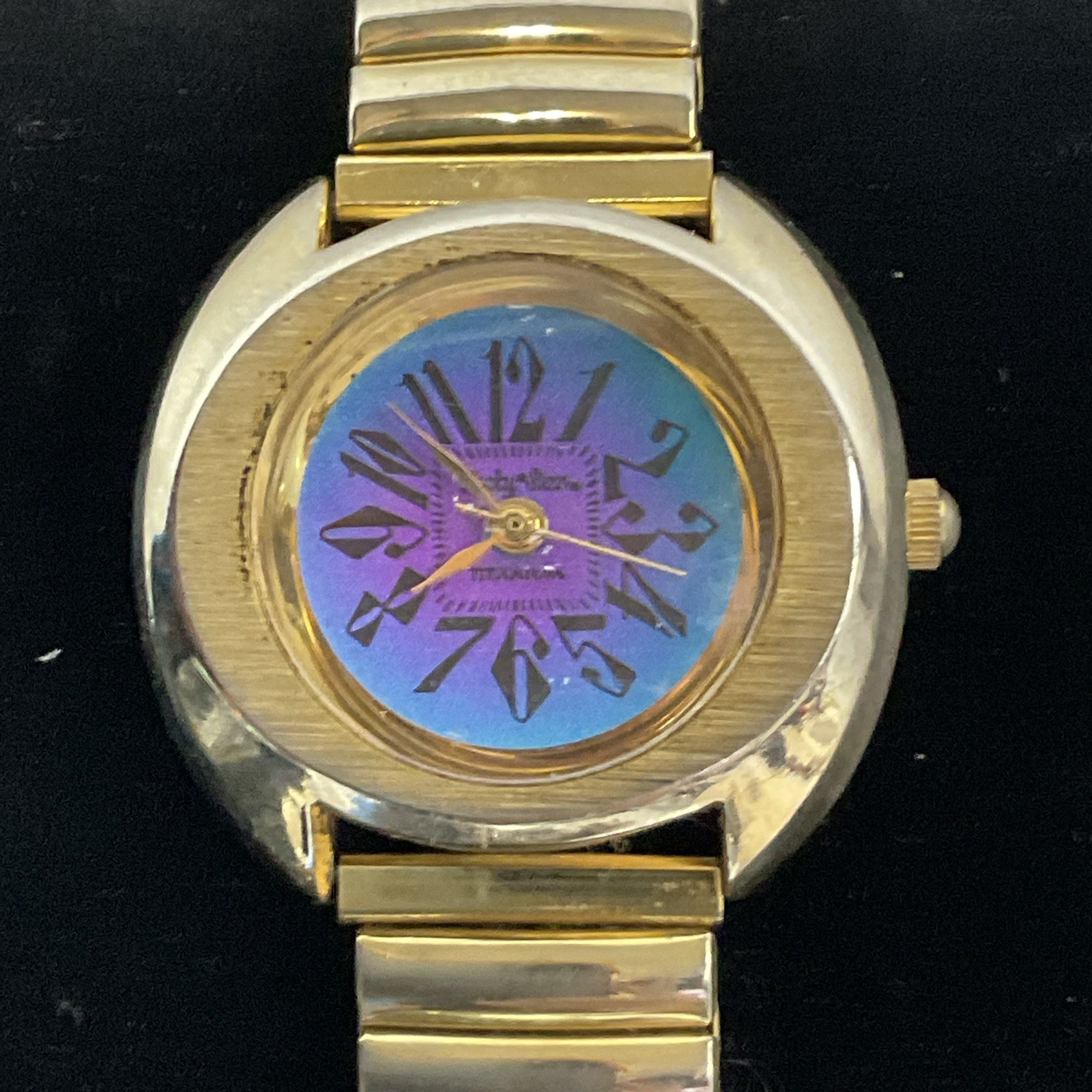 Lucky Star Titanium Purple Face Hold Tone Stretch Band Watch - Image 1