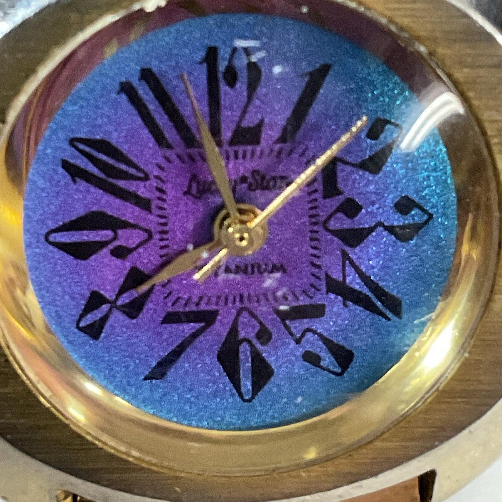 Lucky Star Titanium Purple Face Hold Tone Stretch Band Watch - Image 7
