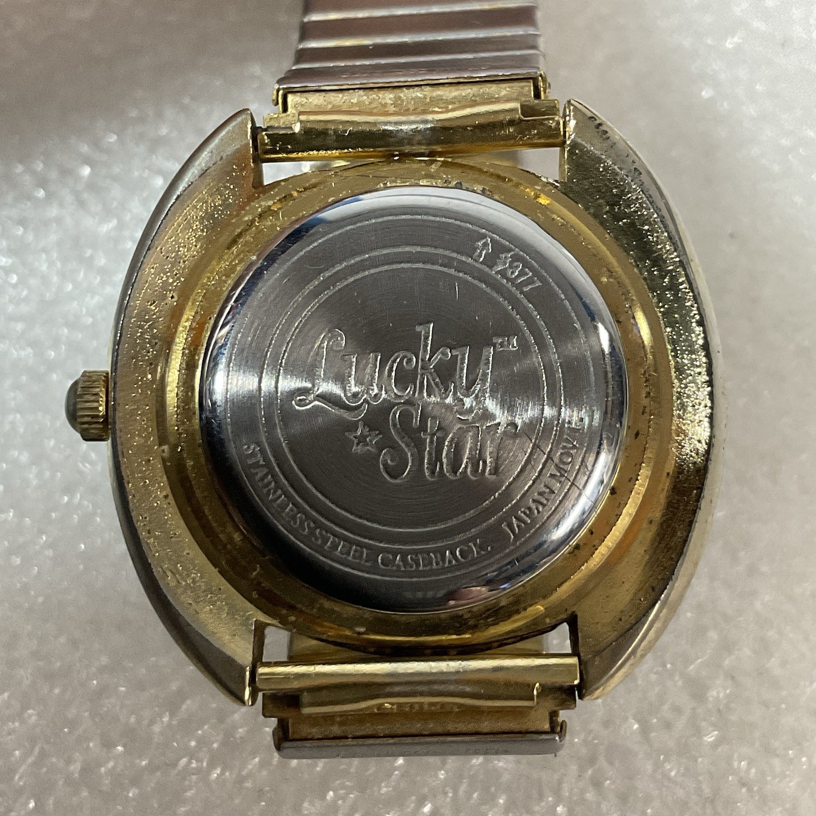 Lucky Star Titanium Purple Face Hold Tone Stretch Band Watch - Image 10