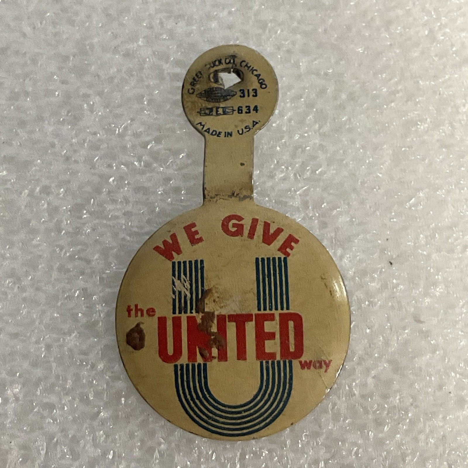 We Give The United Way Fold Over .75” Button Made By Green Duck Co - Image 1