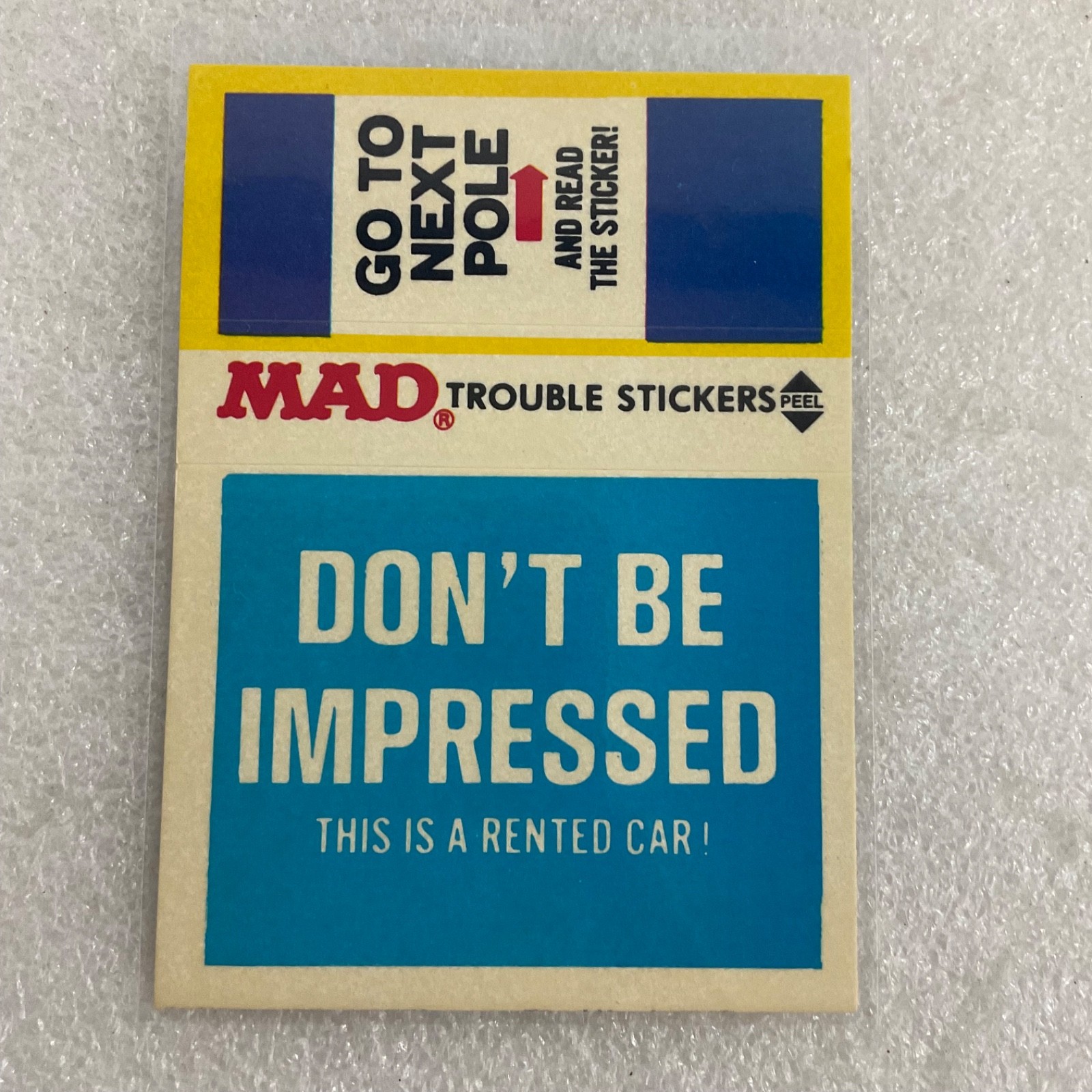 1983 MAD Trouble Stickers Dont Be Impressed Fleer Sticker Card - Image 1