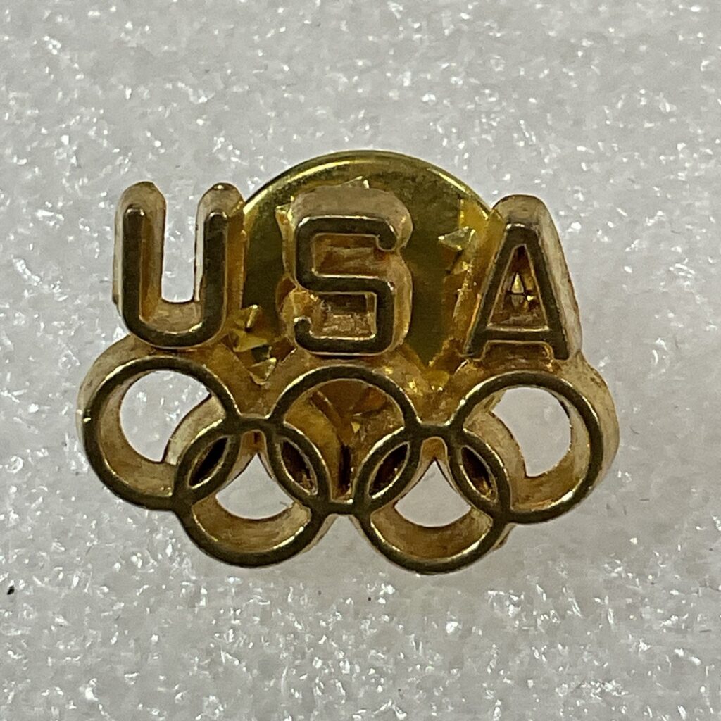 USA Gold Toned Olympic Rings Pin Pinback GnuCollectibles - Image 1