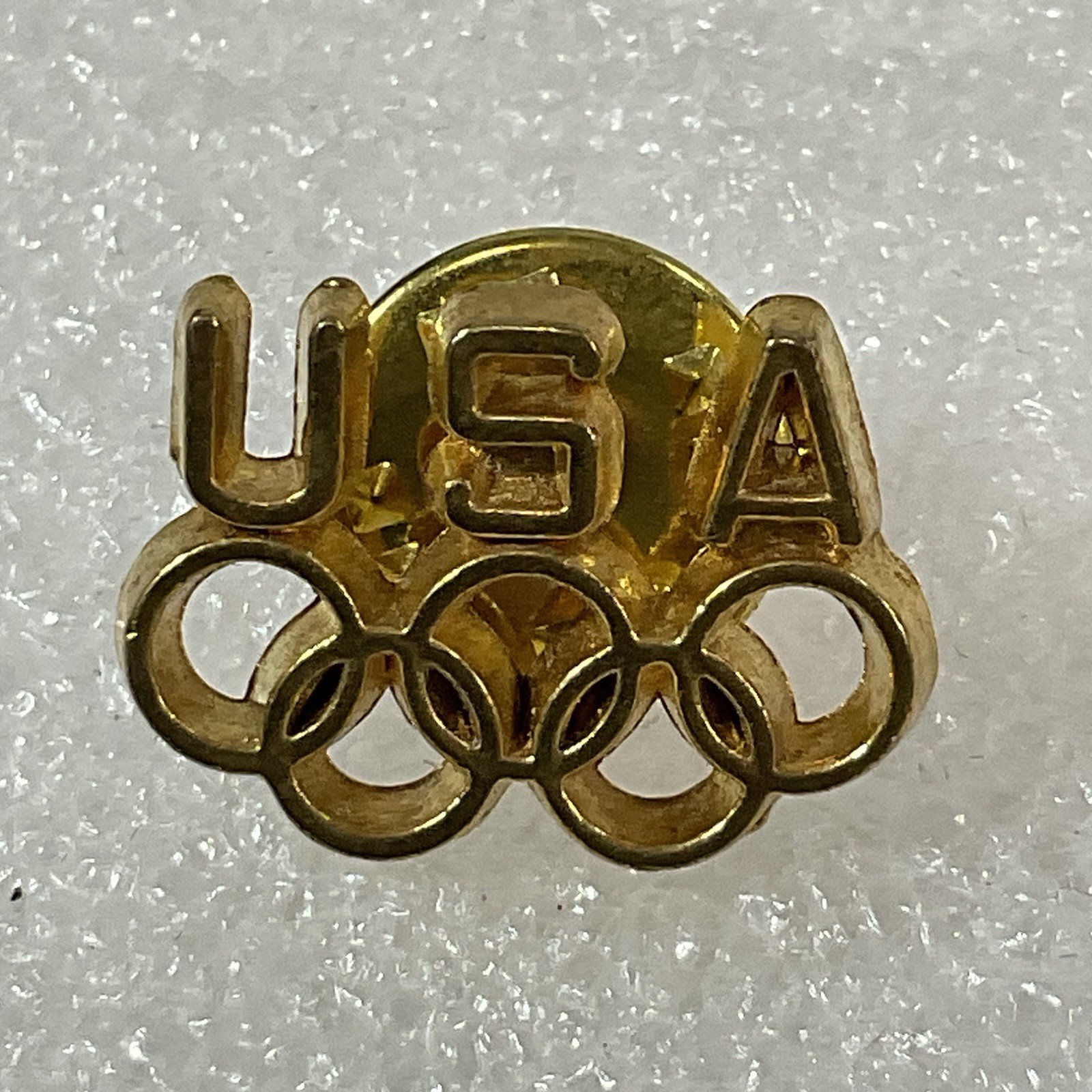 USA Gold Toned Olympic Rings Pin Pinback GnuCollectibles - Image 1