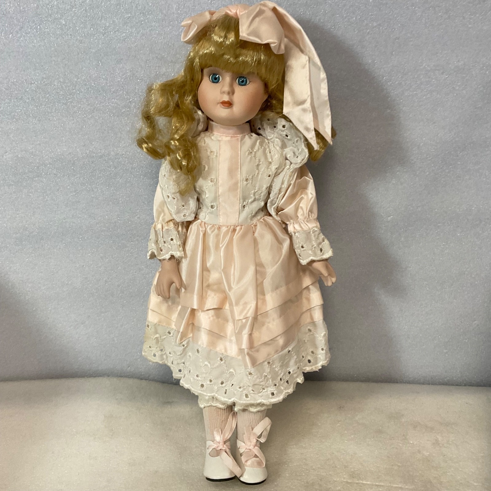 Blonde Blue Eyed Porcelain Doll 15.5in Pink Dress White Lace Bow - Image 1