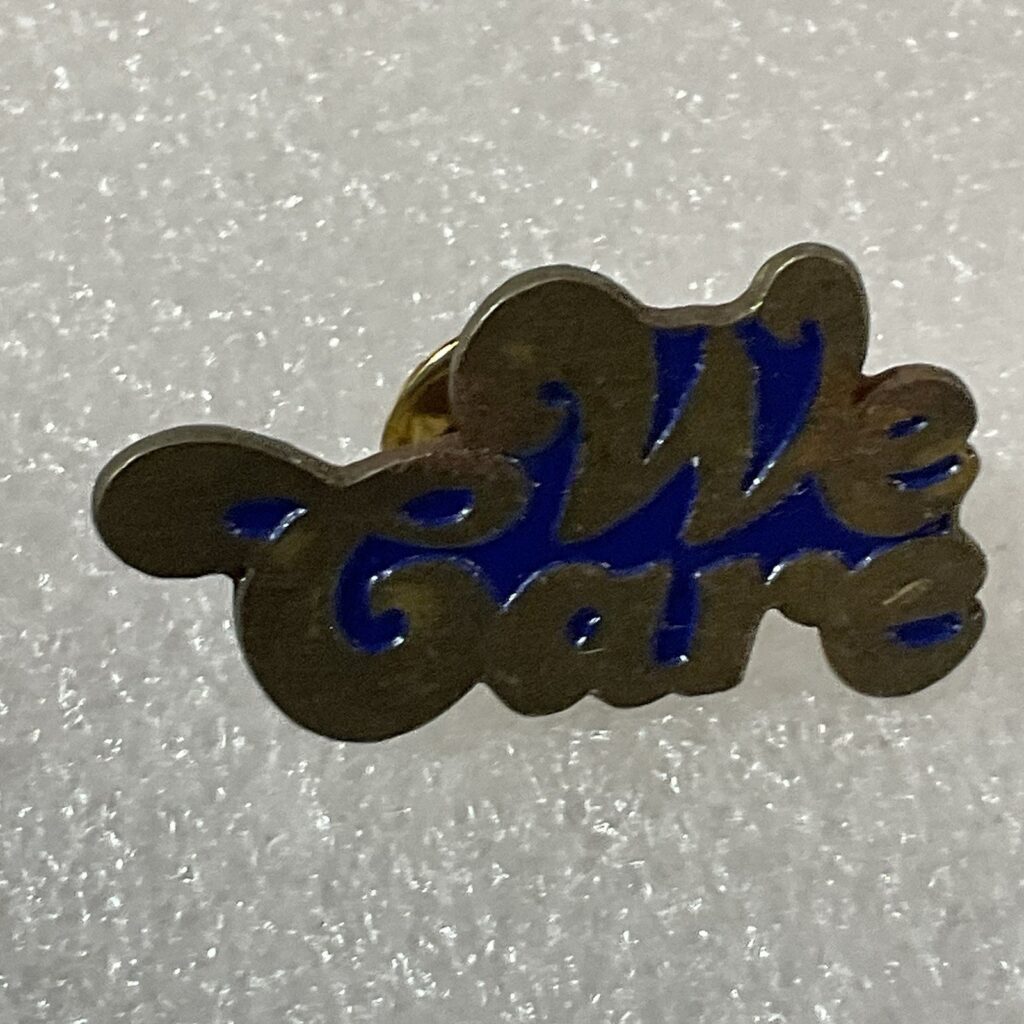 We Care Vintage 1.25” Enamel On Mental Pin Pinback GnuCollectibles - Image 1