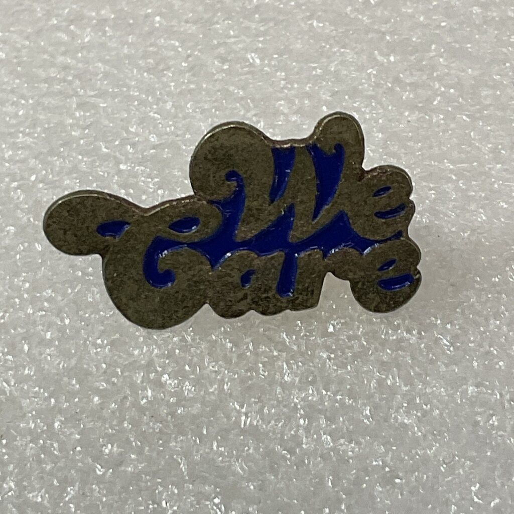 We Care Vintage 1.25” Enamel On Mental Pin Pinback GnuCollectibles - Image 1