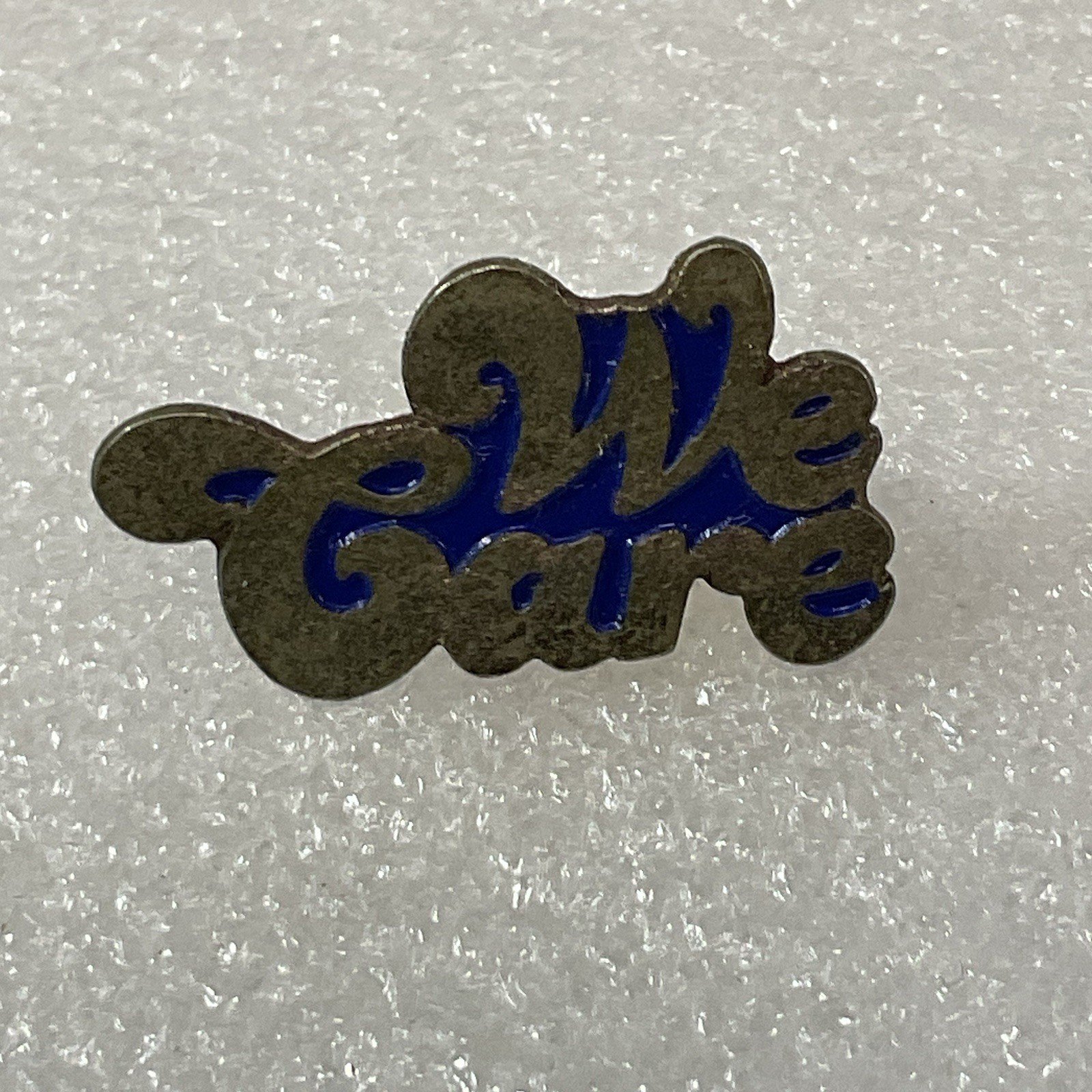 We Care Vintage 1.25” Enamel On Mental Pin Pinback GnuCollectibles - Image 1