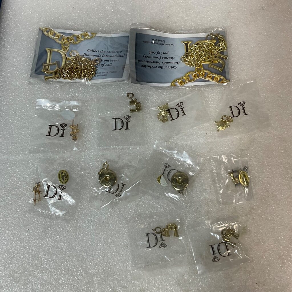 Diamonds International Di Lot Gold Tone Charm Bracelets Earrings & Charms Set - Image 1