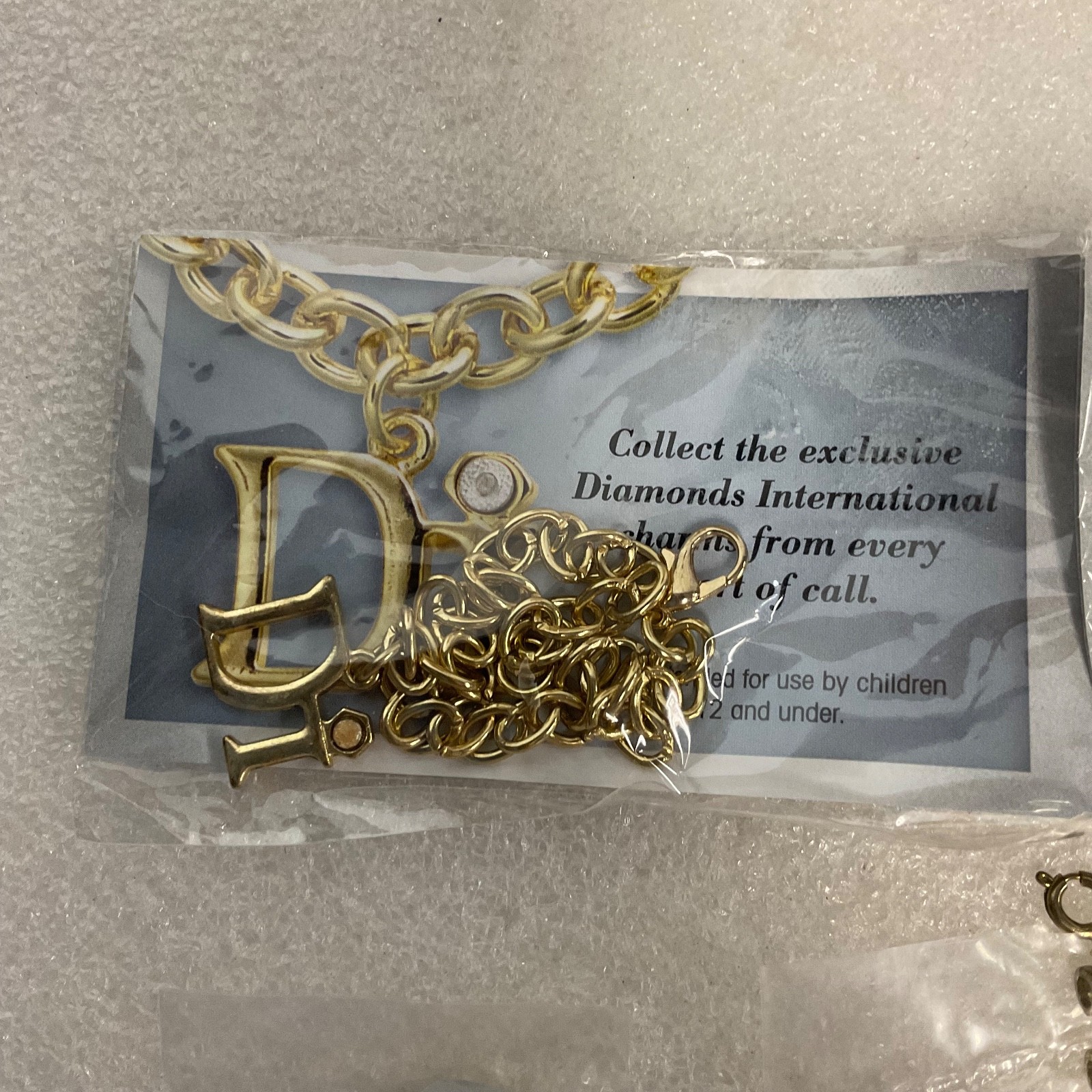 Diamonds International Di Lot Gold Tone Charm Bracelets Earrings & Charms Set - Image 2