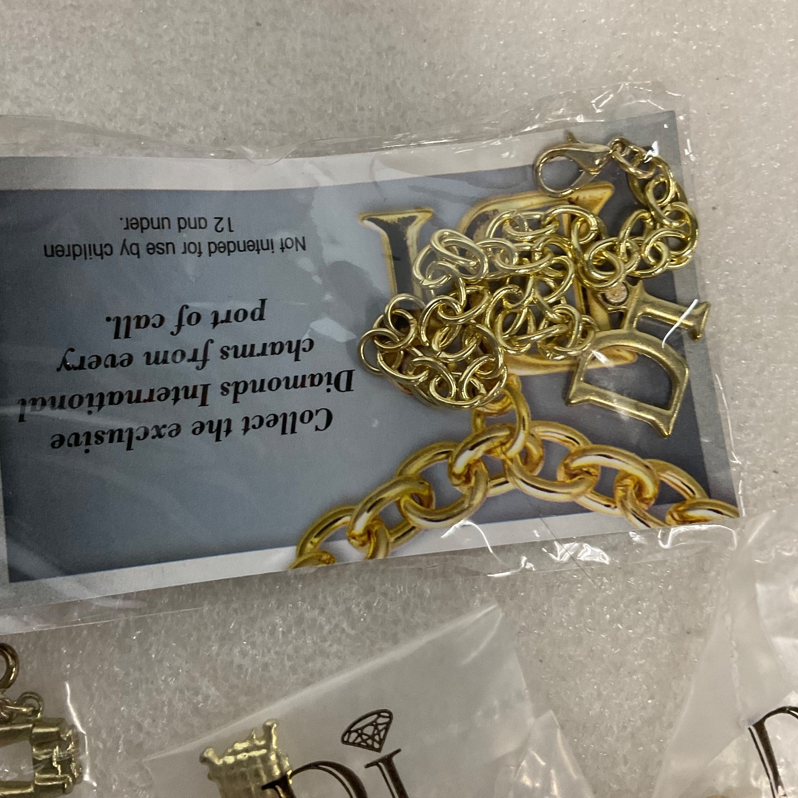 Diamonds International Di Lot Gold Tone Charm Bracelets Earrings & Charms Set - Image 3