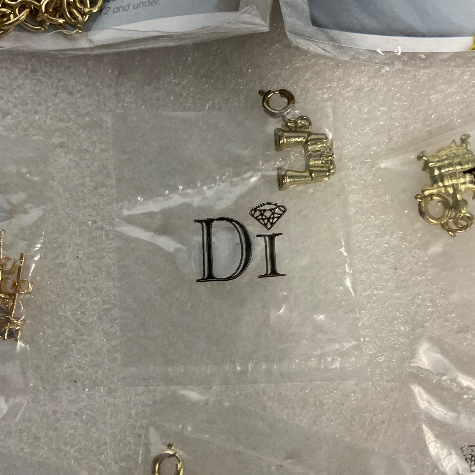 Diamonds International Di Lot Gold Tone Charm Bracelets Earrings & Charms Set - Image 5