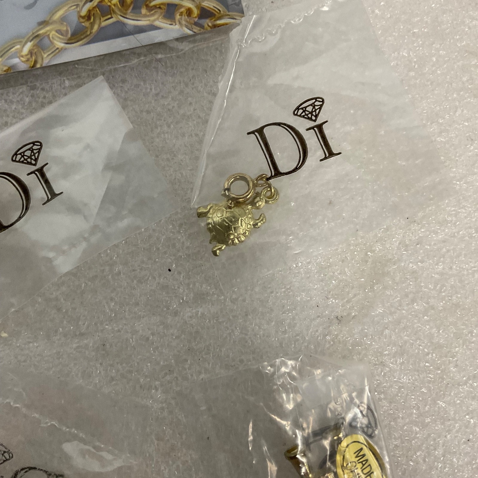 Diamonds International Di Lot Gold Tone Charm Bracelets Earrings & Charms Set - Image 7