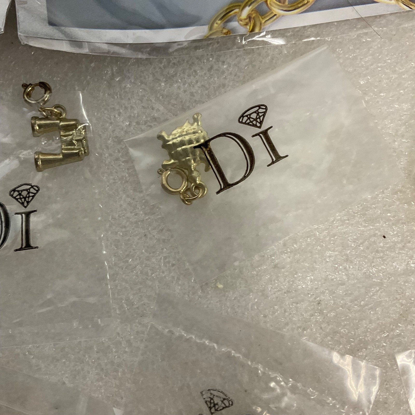 Diamonds International Di Lot Gold Tone Charm Bracelets Earrings & Charms Set - Image 6