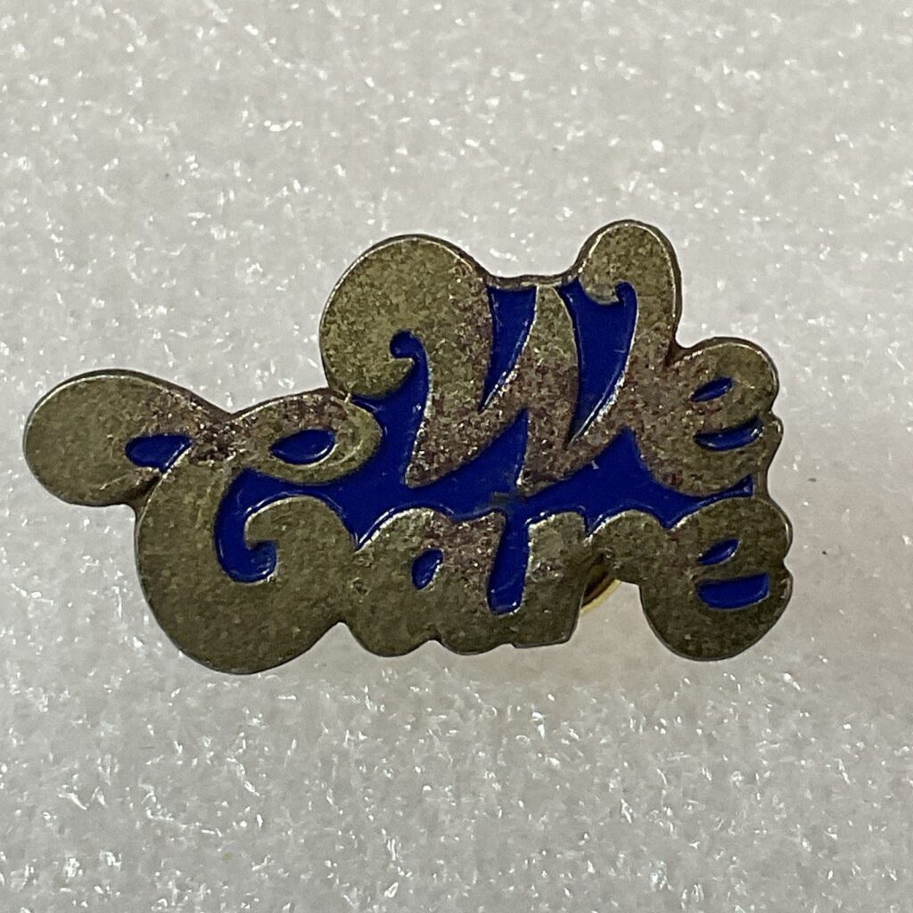 We Care Vintage 1.25” Enamel On Mental Pin Pinback GnuCollectibles - Image 1