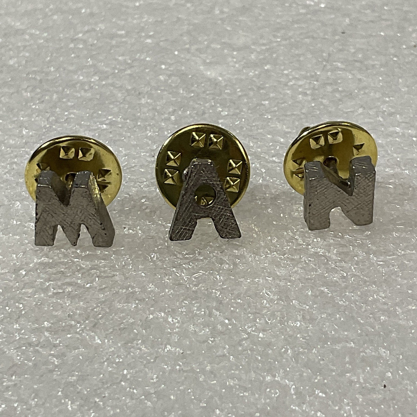 Vintage M A N Letter Metal Pin Pinbacks GnuCollectibles - Image 1