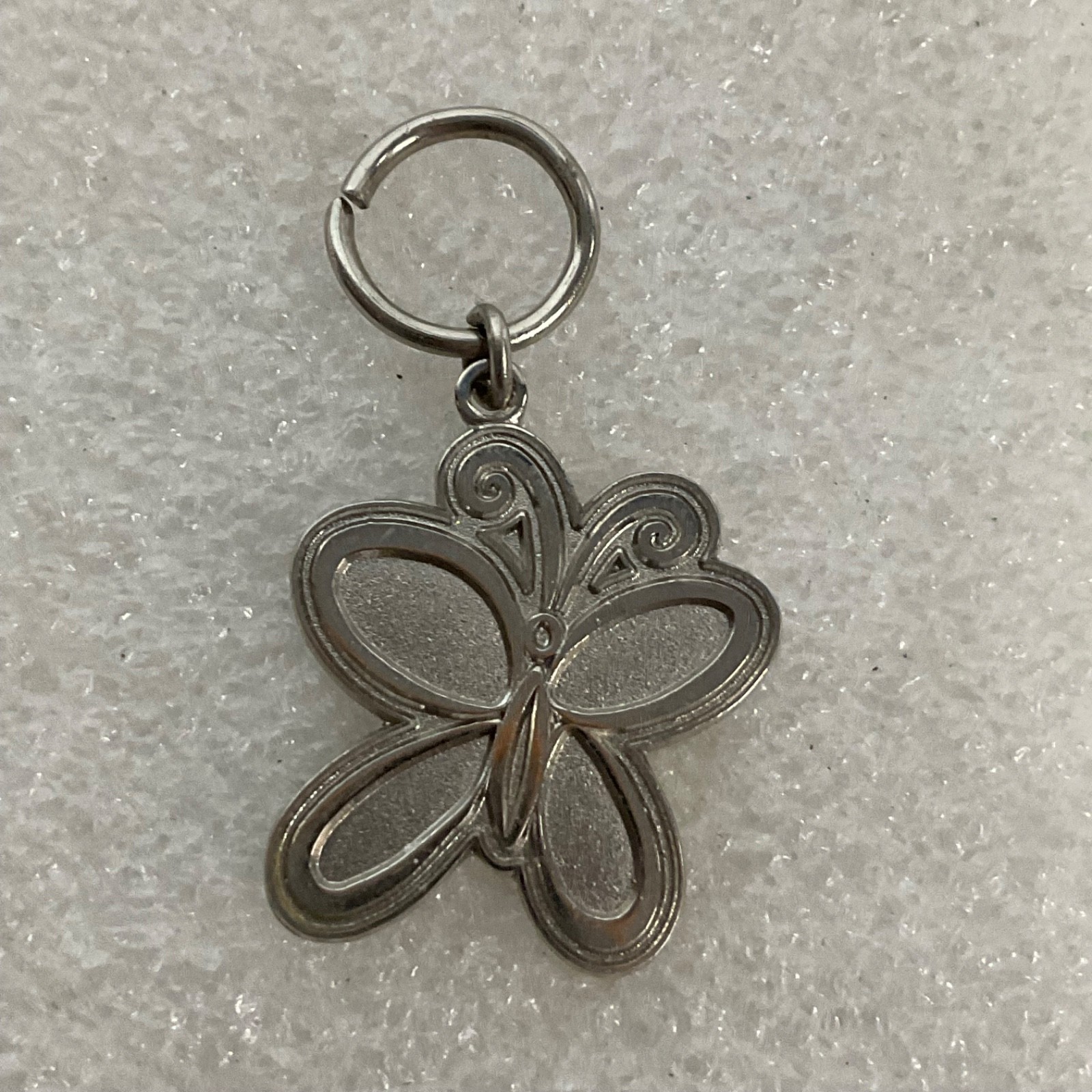 Disney 2004 Silver Tone Butterfly Charm 1in Official Pin Trading Jewelry - Image 1
