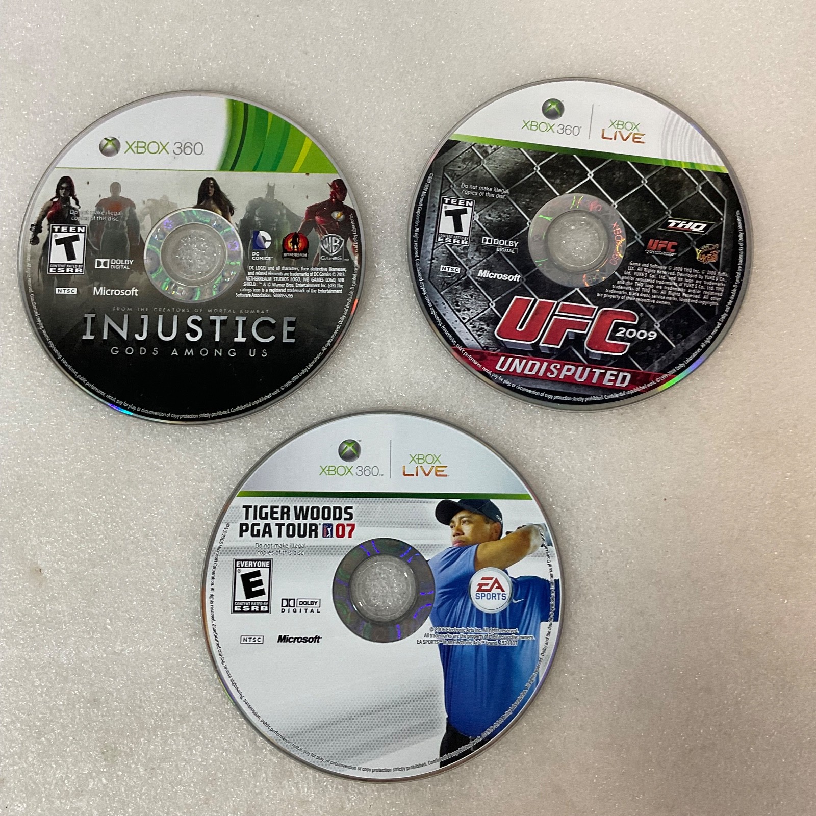 Xbox 360 3 Game Lot Disc Only – Injustice Gods Among Us, UFC 2009, Tiger Woods P - Image 1