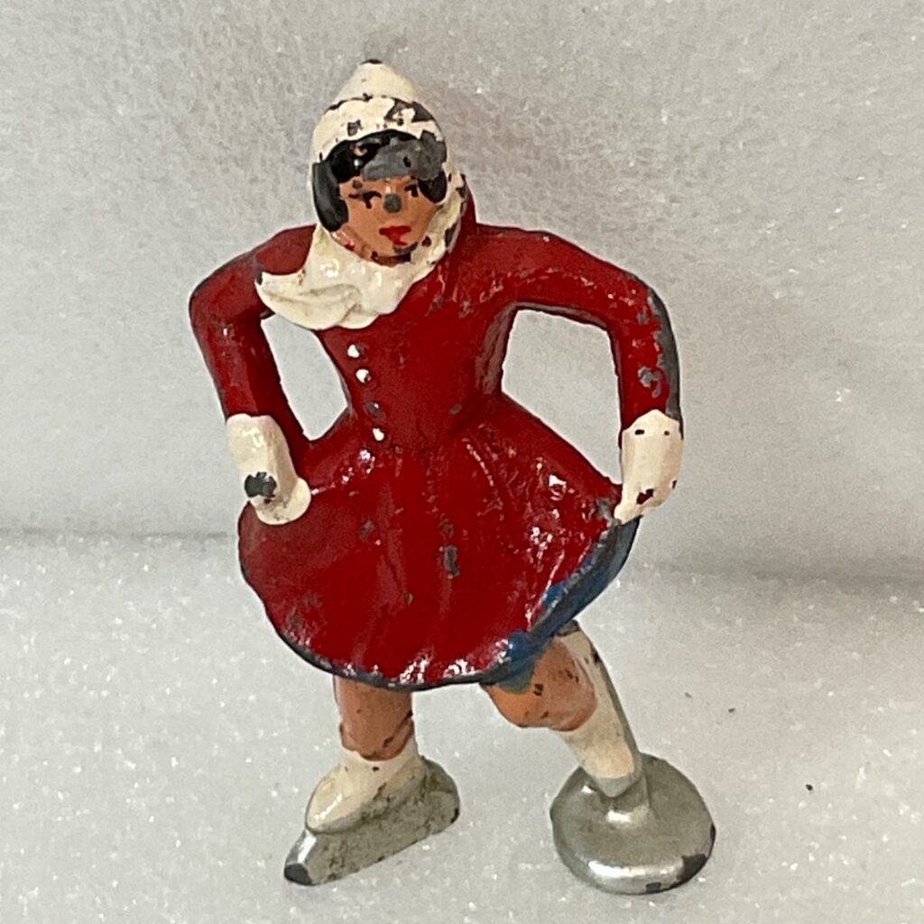 Vintage Lead Ice Skater Figurine Hand Painted Red Coat 2.25in Winter Scene - Image 1