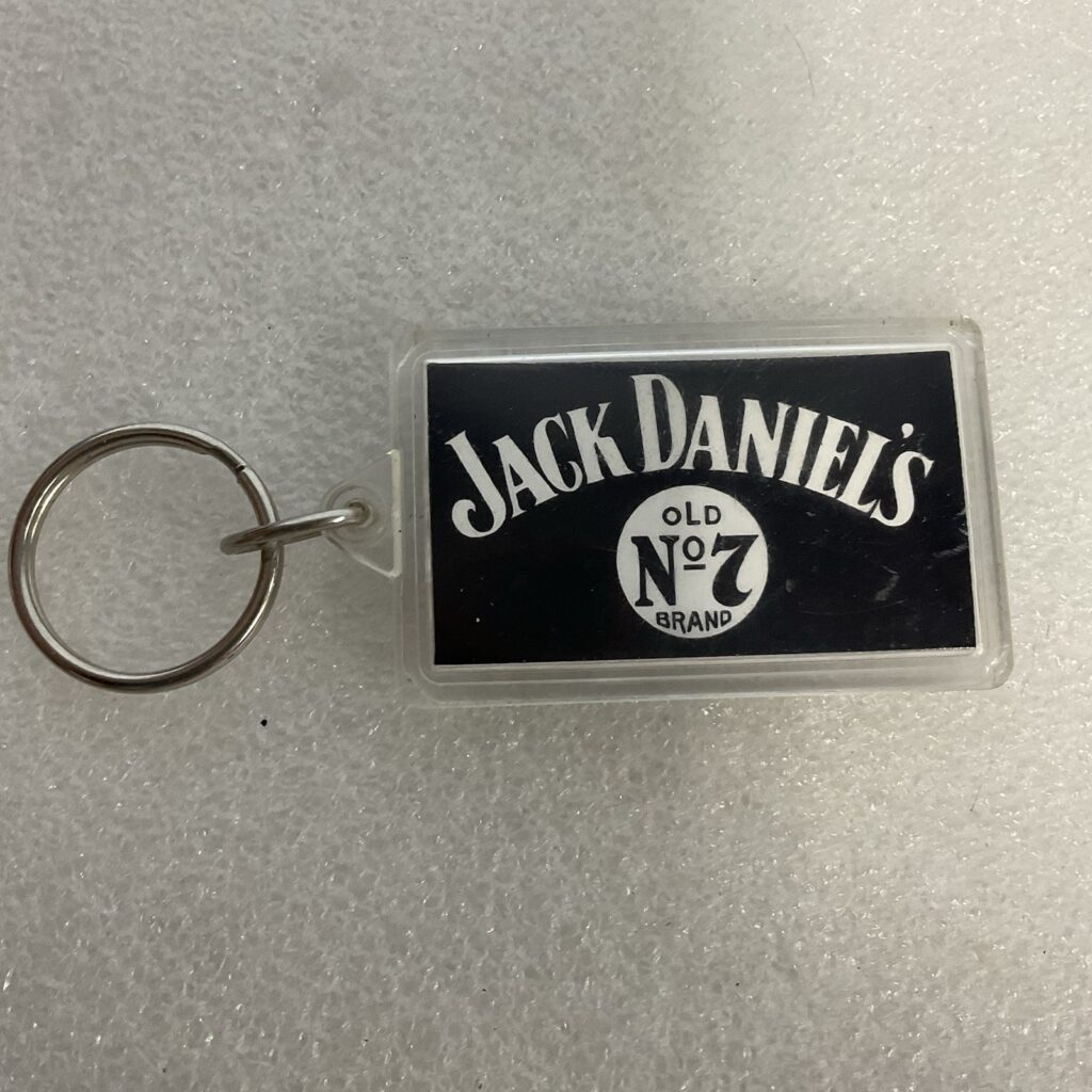 Jack Daniel’s Old No. 7 Brand Keychain Black White Logo Plastic Bar Whiskey - Image 1