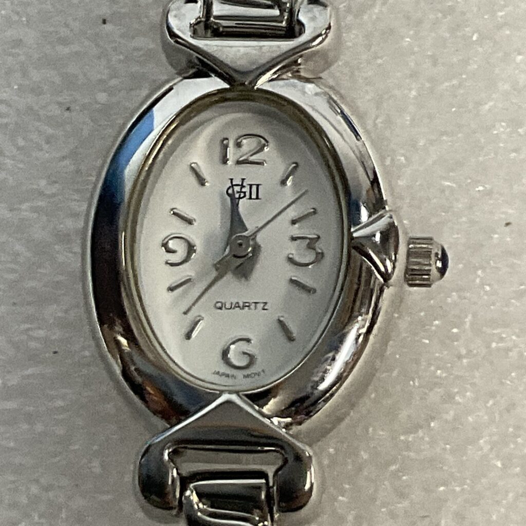 Gloria Vanderbilt GV II Silver Toned Bracelet Watch Clear Stones - Image 1