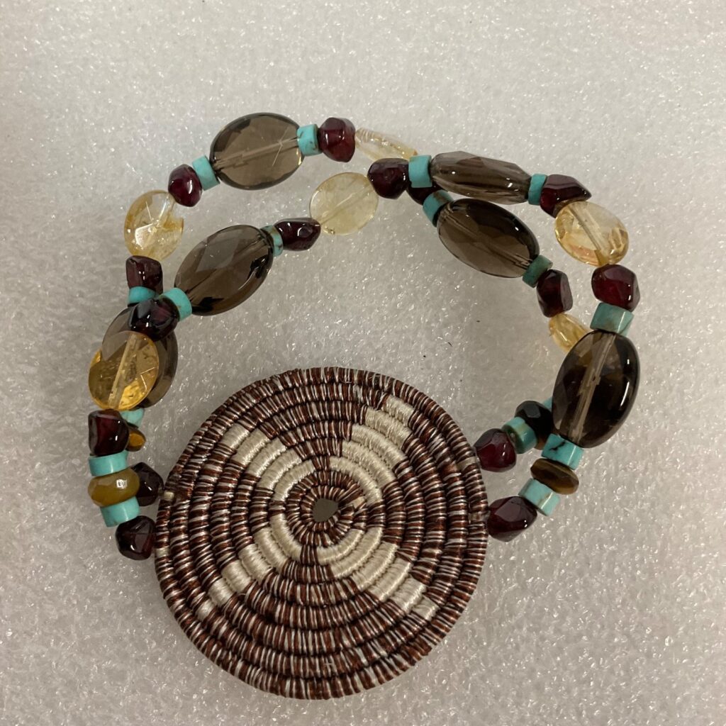 6.75in Mixed Glass Beaded Bracelet with Woven Disc Brown Yellow Turquoise Accent - Image 1