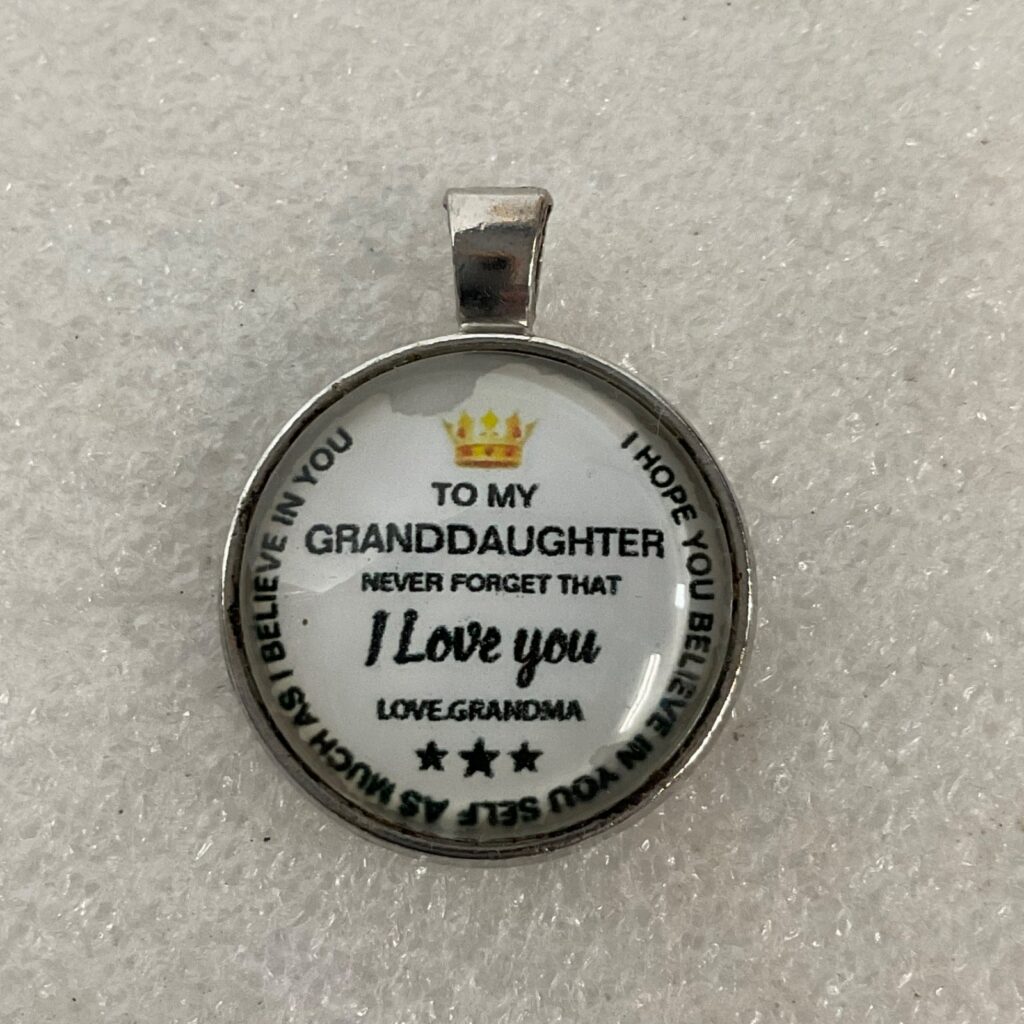 1.5in To My Granddaughter Love Grandma Round Pendant Silver Tone - Image 1