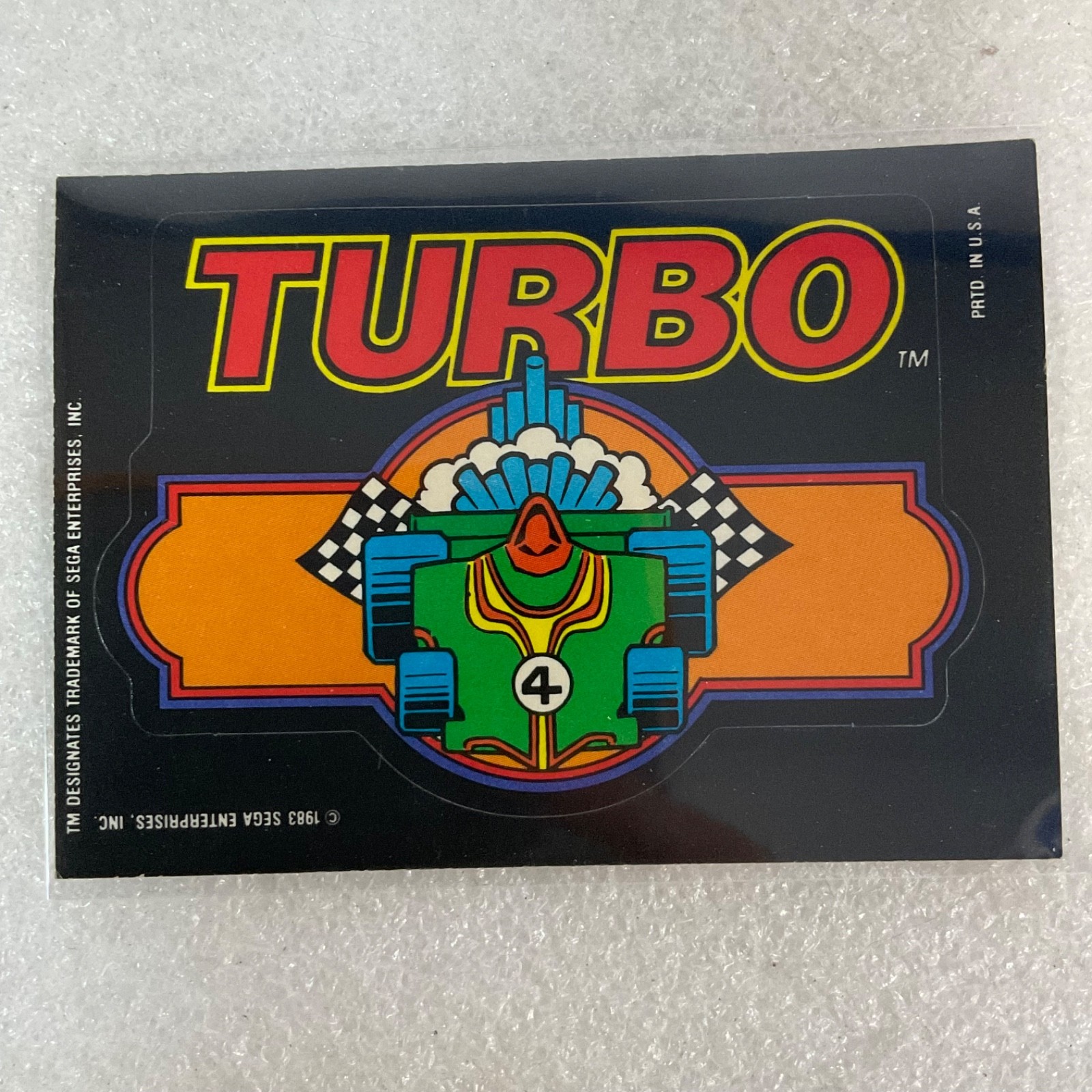 1983 Topps Video City Sega Turbo Really Moves Die-Cut Sticker Card - Image 1