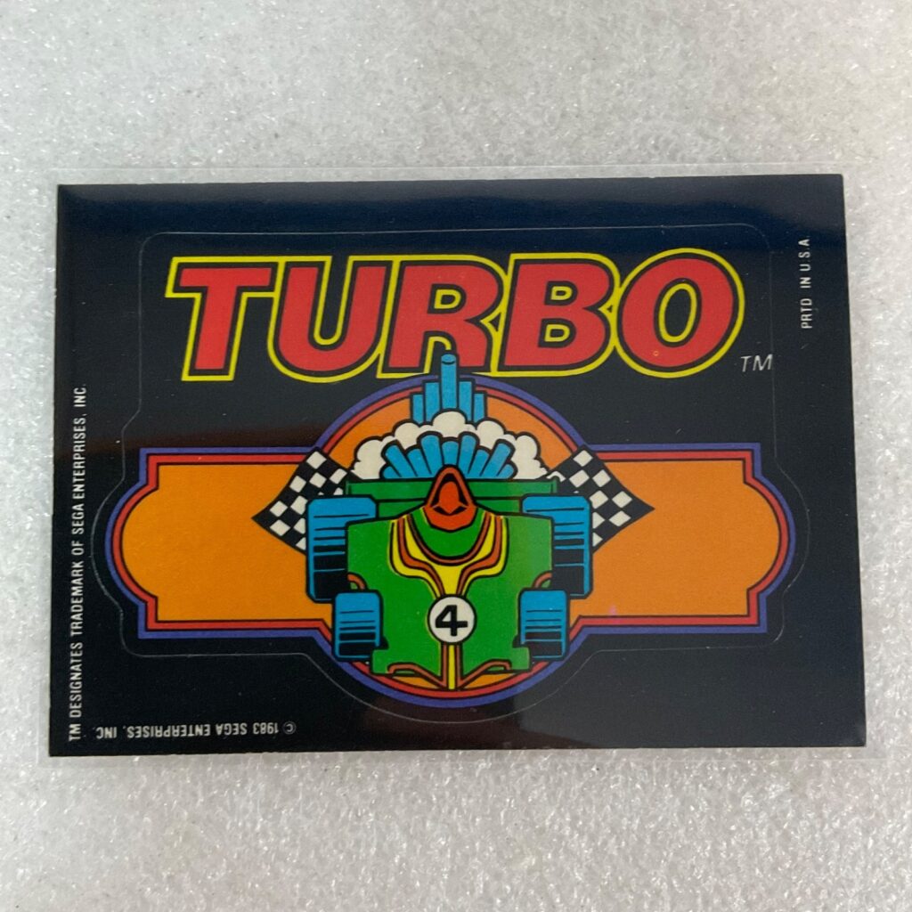 1983 Topps Video City Sega Turbo Logo Sticker Card Vintage Arcade Game - Image 1