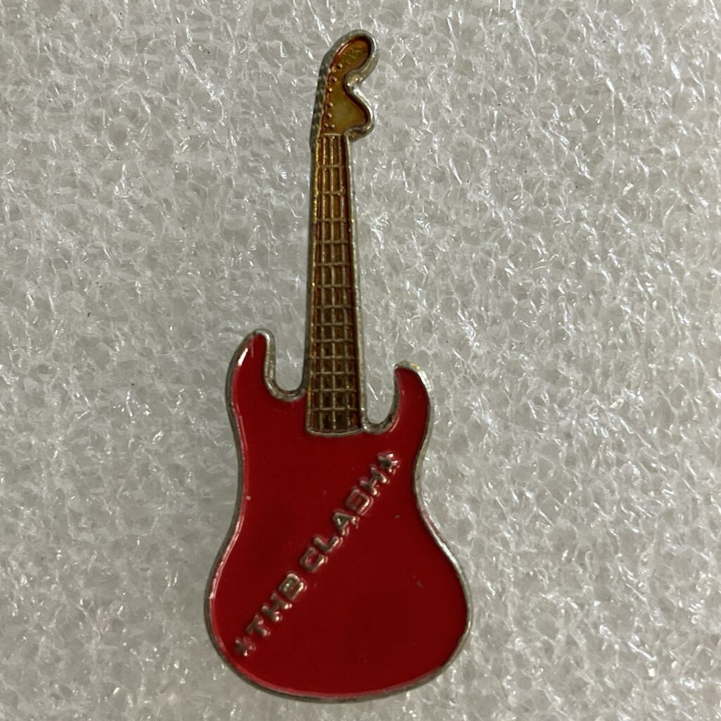 Vintage 1980’s The Clash English Rock Band 1.5" Red & Gold Metal Guitar Pin - Image 1
