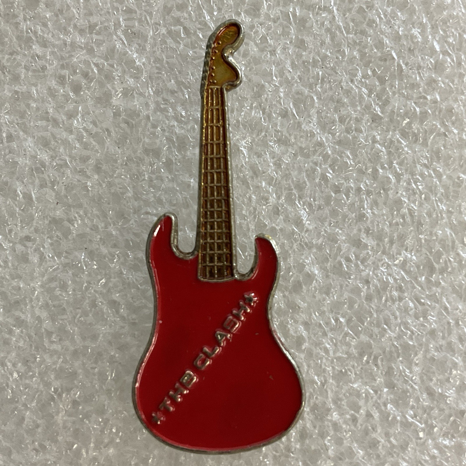 Vintage 1980’s The Clash English Rock Band 1.5" Red & Gold Metal Guitar Pin - Image 1