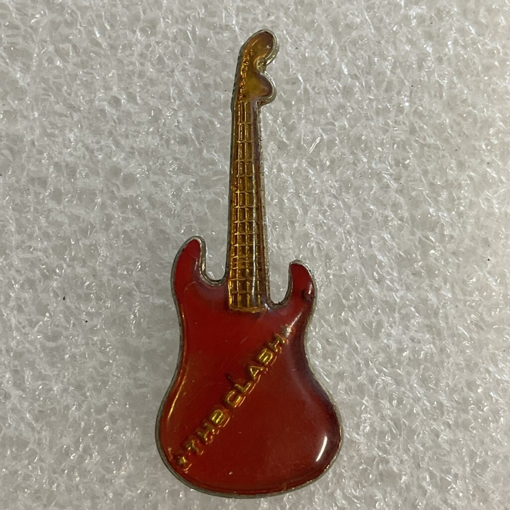 1980’s The Clash English Rock Band 1.5" Red & Gold Vintage Metal Guitar Pin - Image 1