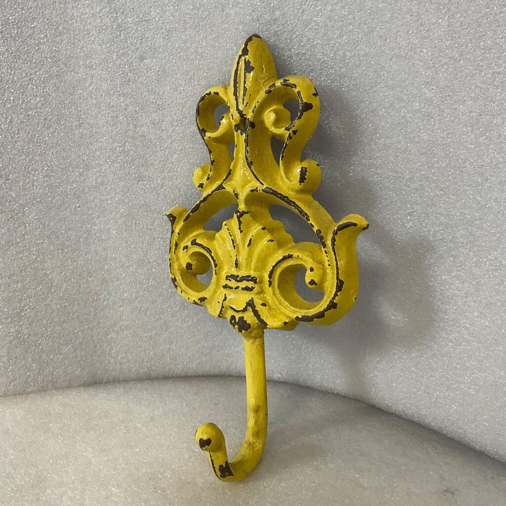 Yellow Cast Iron Fleur De Lis Wall Hook 5.5in Distressed Hanger - Image 1
