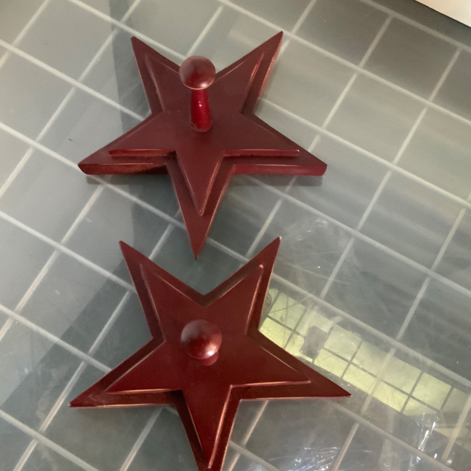 The Land of Nod Red Star Wood Wall Hooks 7 in Set of 2 - Image 1